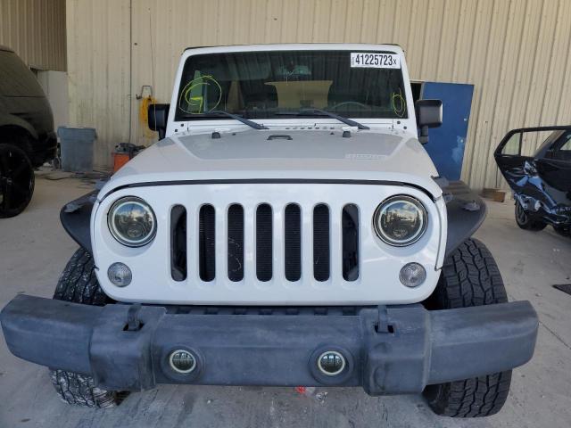 Photo 5 from auction – 2016 JEEP WRANGLER U with VIN 1C4BJWDG0GL329001