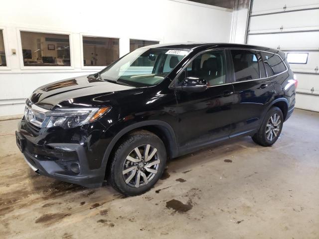 HONDA PILOT EXL 2021 with VIN 5FNYF6H55MB063591 - Photo from auction