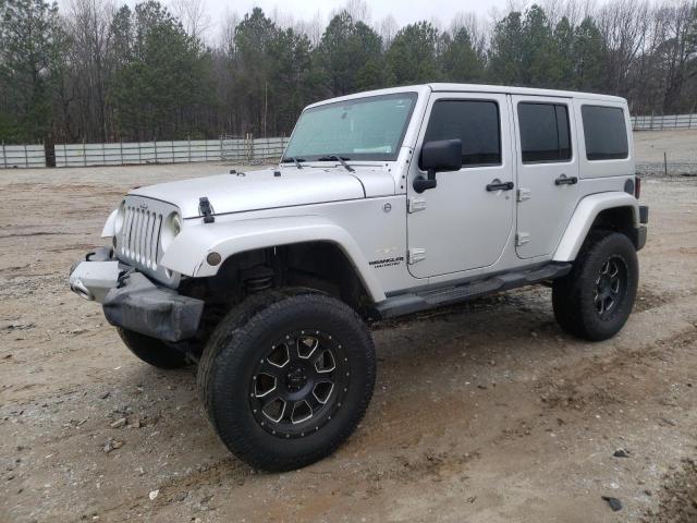 JEEP WRANGLER U 2011 with VIN 1J4BA5H13BL618666 - Photo from auction