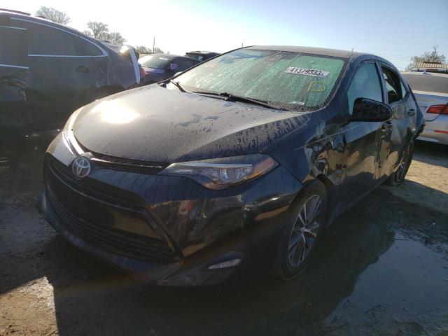 TOYOTA COROLLA L 2017 with VIN 2T1BURHE3HC821175 - Photo from auction