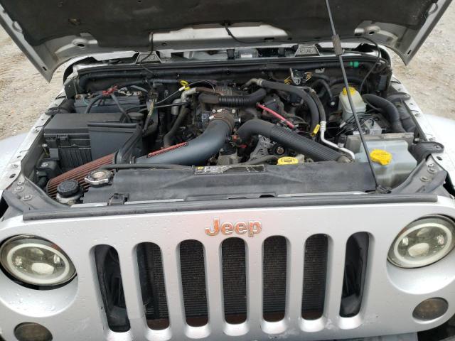 Photo 11 from auction – 2011 JEEP WRANGLER U with VIN 1J4BA5H13BL618666
