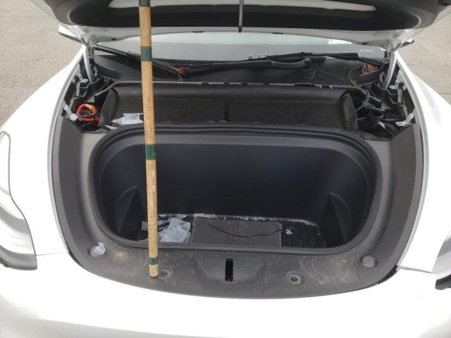 Снимка 11 от търг – 2022 TESLA MODEL Y с VIN 7SAYGDEE1NF386059