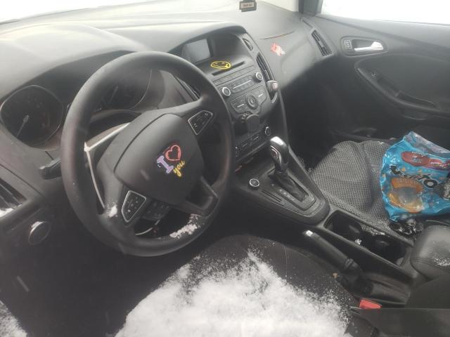 Foto 7 de la subasta – 2015 FORD FOCUS SE con VIN 1FADP3K27FL386510