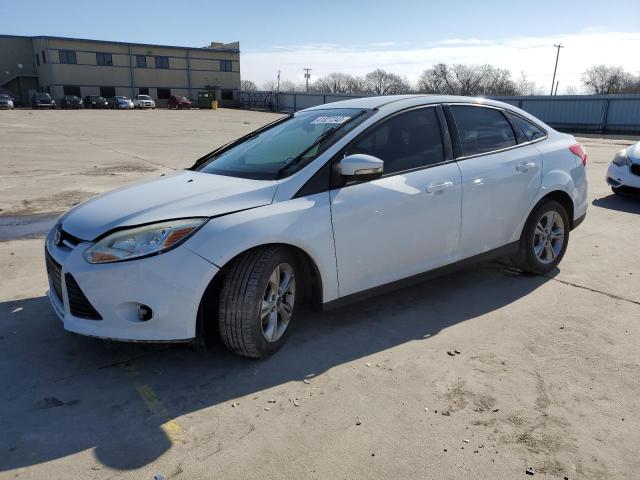 FORD FOCUS SE 2014 with VIN 1FADP3F24EL419469 - Photo from auction