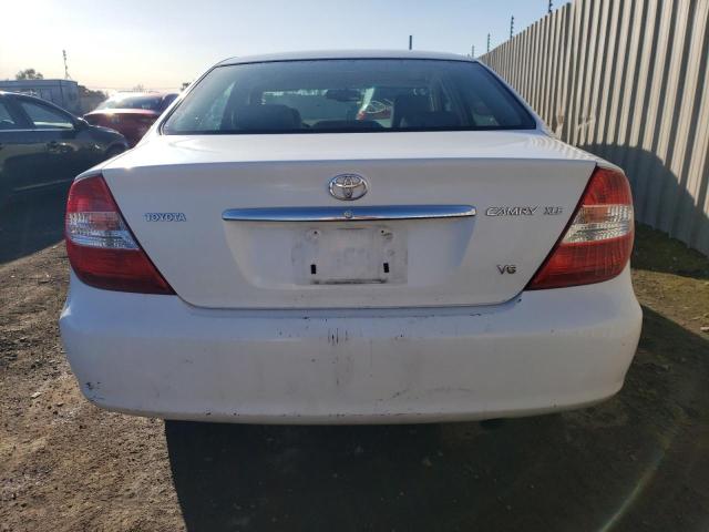 Photo 6 from auction – 2004 TOYOTA CAMRY LE with VIN JTDBF30K440153013