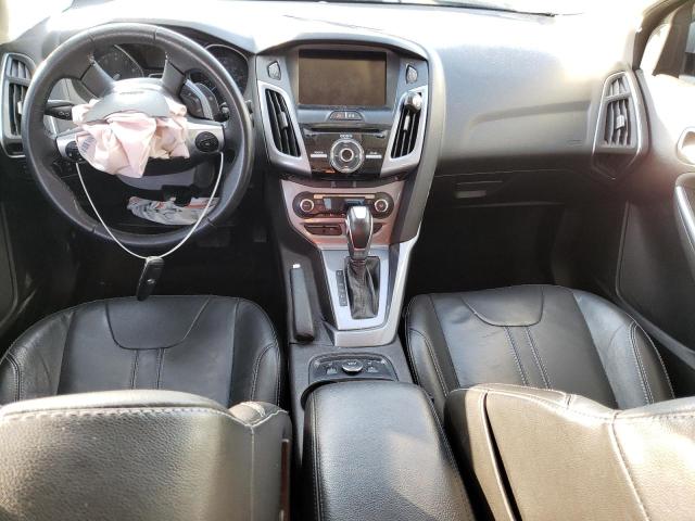 Photo 8 from auction – 2014 FORD FOCUS TITA with VIN 1FADP3J29EL344159