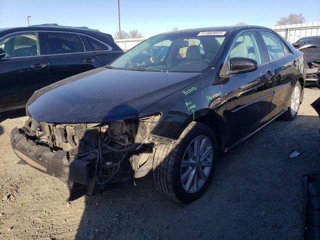 Photo 1 from auction – 2014 TOYOTA CAMRY HYBR with VIN 4T1BD1FKXEU097683