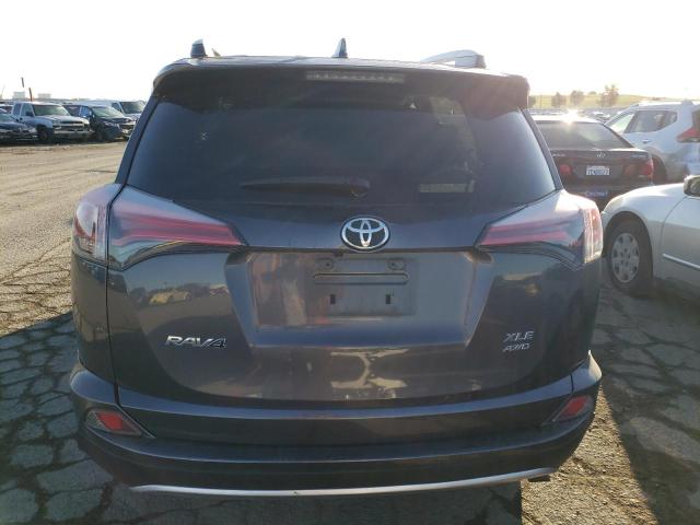 Photo 6 from auction – 2016 TOYOTA RAV4 XLE with VIN 2T3RFREV9GW464506