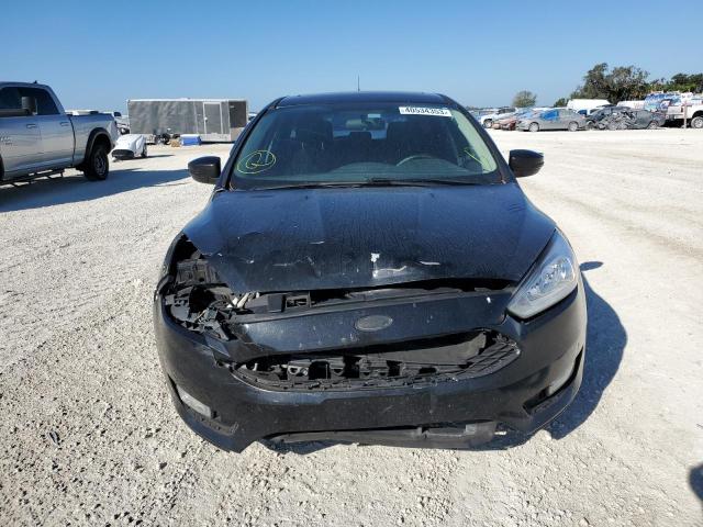 Photo 5 from auction – 2015 FORD FOCUS SE with VIN 1FADP3K20FL215310