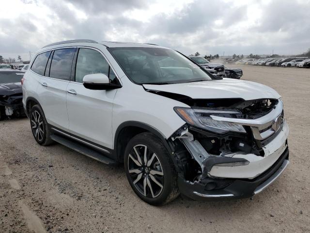 Photo 4 from auction – 2022 HONDA PILOT TOUR with VIN 5FNYF5H61NB012979