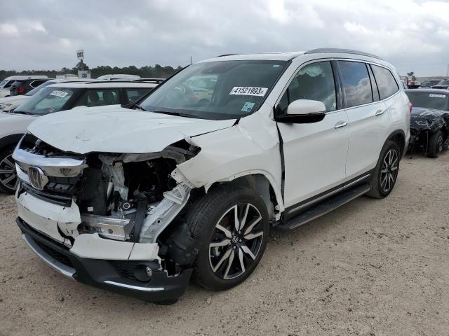 HONDA PILOT TOUR 2022 with VIN 5FNYF5H61NB012979 - Photo from auction