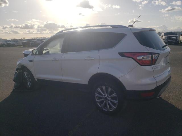 Photo 2 from auction – 2017 FORD ESCAPE TIT with VIN 1FMCU9J98HUB81772