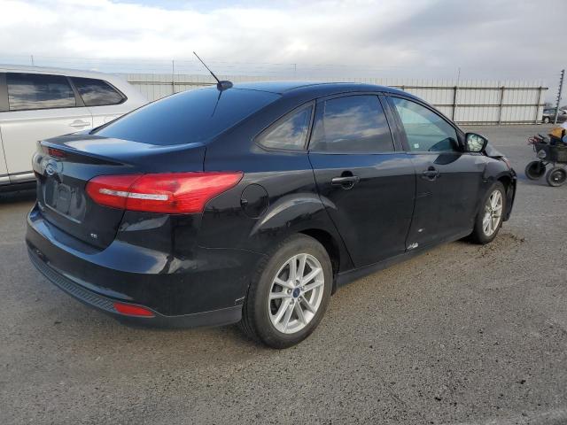 Photo 3 from auction – 2018 FORD FOCUS SE with VIN 1FADP3F23JL251043