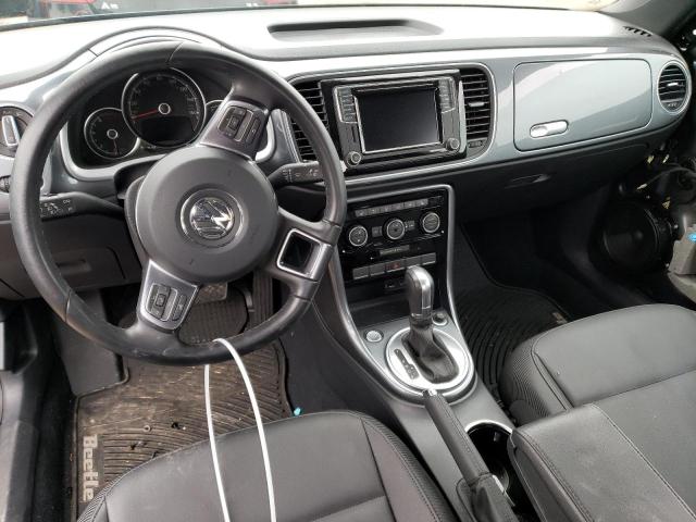 Photo 8 from auction – 2019 VOLKSWAGEN BEETLE SE with VIN 3VWJD7AT9KM714975