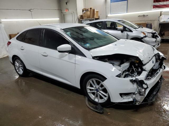 Photo 4 from auction – 2018 FORD FOCUS SE with VIN 1FADP3F2XJL266882