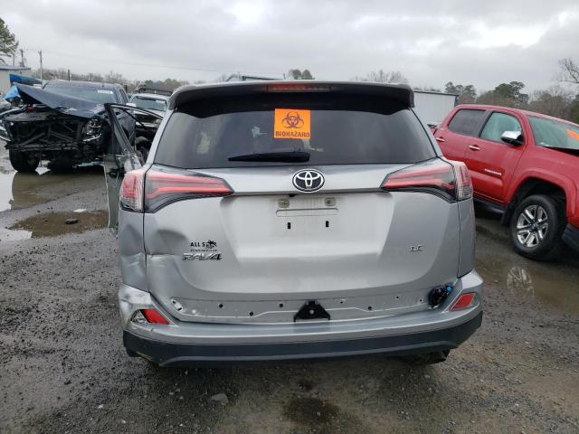 Photo 6 from auction – 2018 TOYOTA RAV4 LE with VIN 2T3ZFREV5JW443952