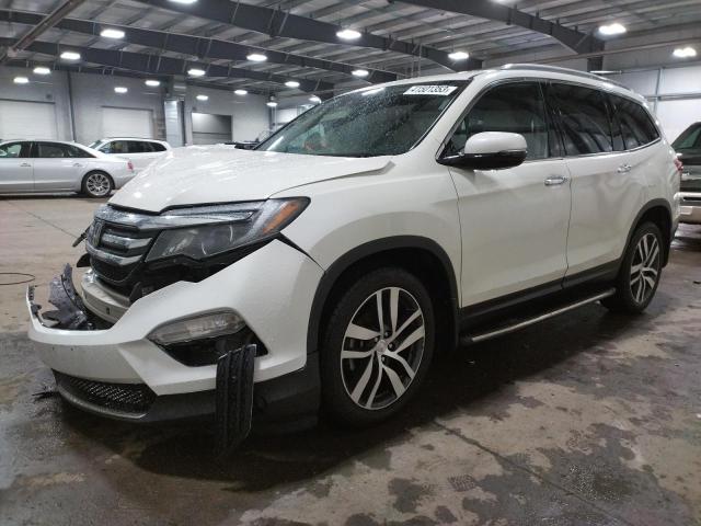 HONDA PILOT TOUR 2016 with VIN 5FNYF6H93GB104937 - Photo from auction