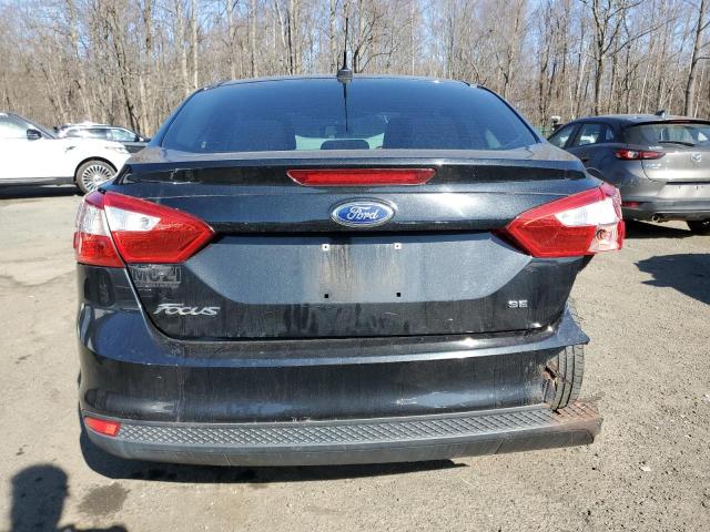 Foto 6 de la subasta – 2013 FORD FOCUS SE con VIN 1FADP3F23DL215647