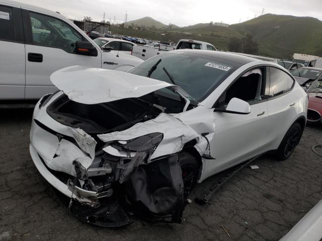 TESLA MODEL Y 2023 with VIN 7SAYGDEE3PA032527 - Photo from auction