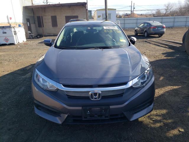 Photo 5 from auction – 2018 HONDA CIVIC LX with VIN 19XFC2F50JE204807