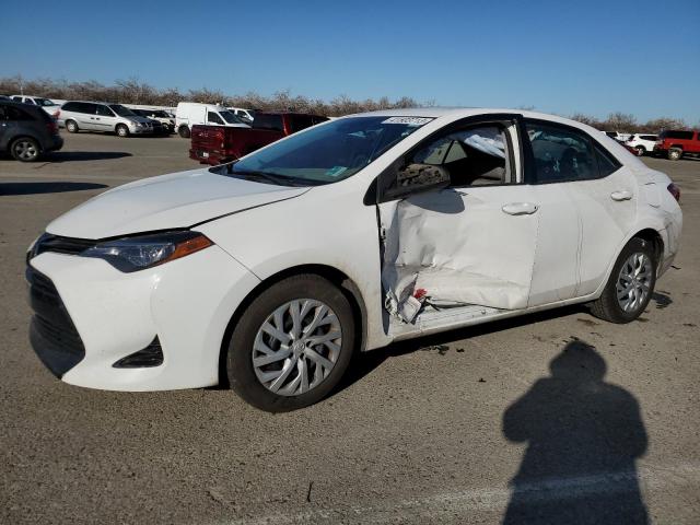 TOYOTA COROLLA L 2017 with VIN 5YFBURHE7HP712010 - Photo from auction