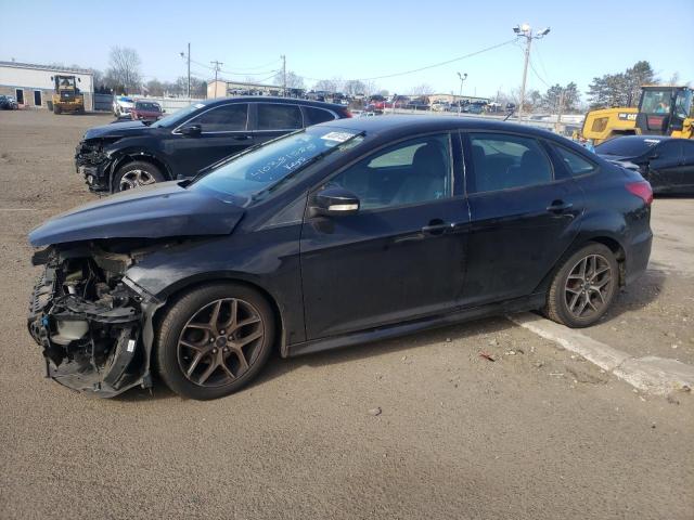 FORD FOCUS SE 2015 with VIN 1FADP3F22FL208580 - Photo from auction