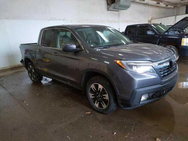 Photo 4 from auction – 2020 HONDA RIDGELINE with VIN 5FPYK3F52LB019132