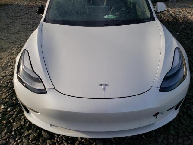 Photo 11 from auction – 2021 TESLA MODEL 3 with VIN 5YJ3E1EBXMF044710