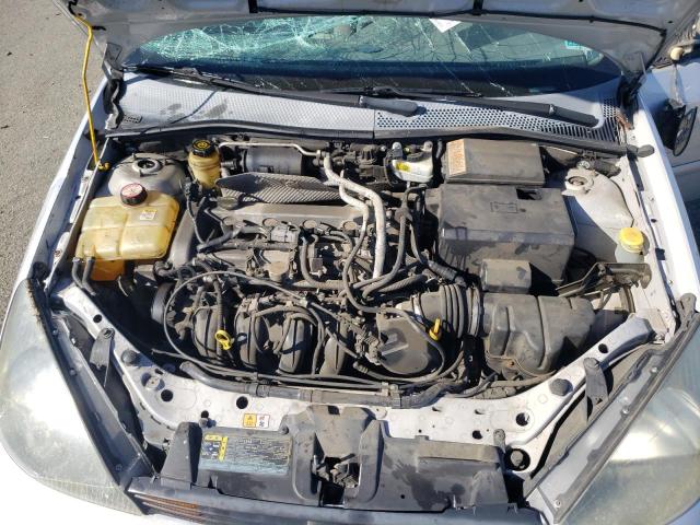 Photo 11 from auction – 2003 FORD FOCUS SE with VIN 1FAFP36ZX3W213672