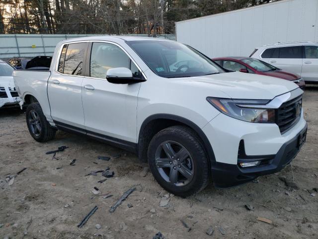 Photo 4 from auction – 2022 HONDA RIDGELINE with VIN 5FPYK3F58NB022233