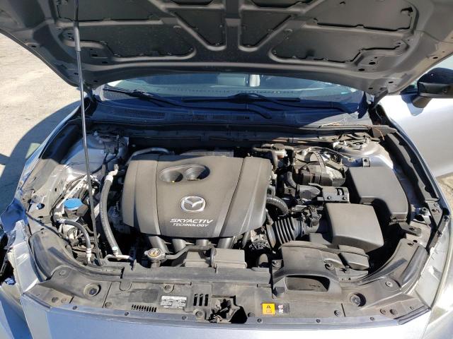 Photo 11 from auction – 2014 MAZDA 3 SV with VIN JM1BM1T77E1214674