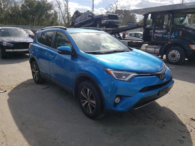 Photo 4 from auction – 2017 TOYOTA RAV4 XLE with VIN JTMRFREV6HD220438