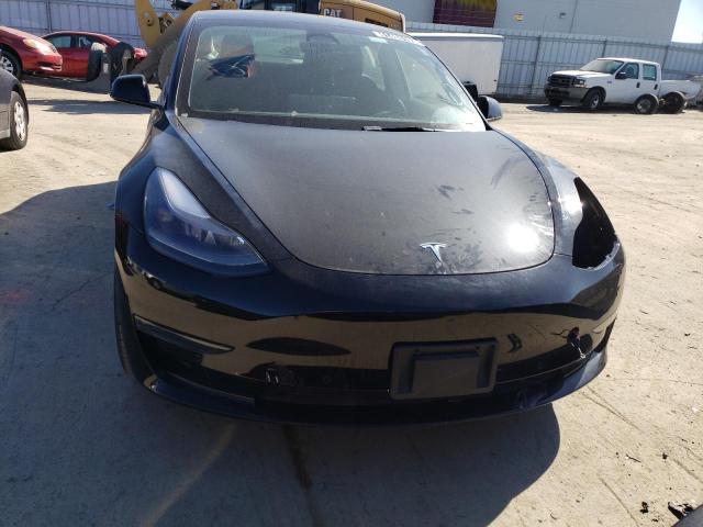 Photo 5 from auction – 2022 TESLA MODEL 3 with VIN 5YJ3E1EA7NF190099