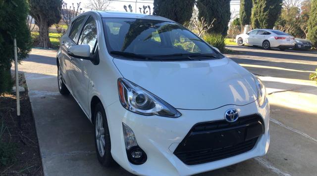 TOYOTA PRIUS C 2015 with VIN JTDKDTB33F1107049 - Photo from auction