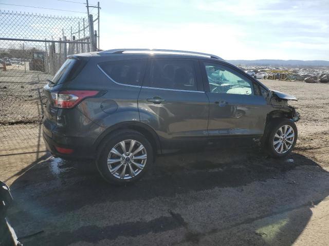 Photo 3 from auction – 2017 FORD ESCAPE TIT with VIN 1FMCU9JD6HUC30651