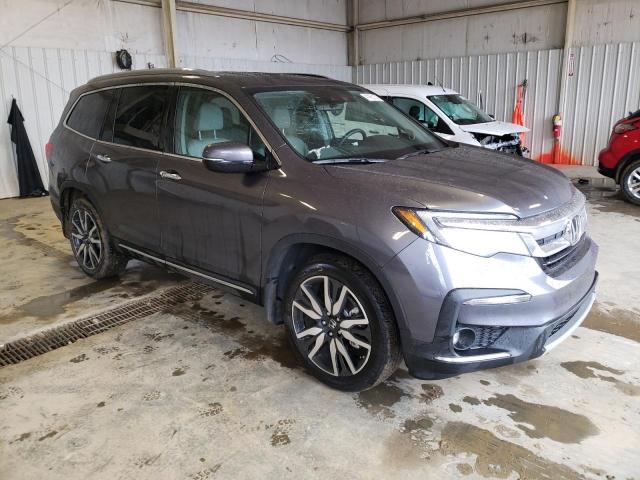 Photo 4 from auction – 2021 HONDA PILOT TOUR with VIN 5FNYF5H66MB039772