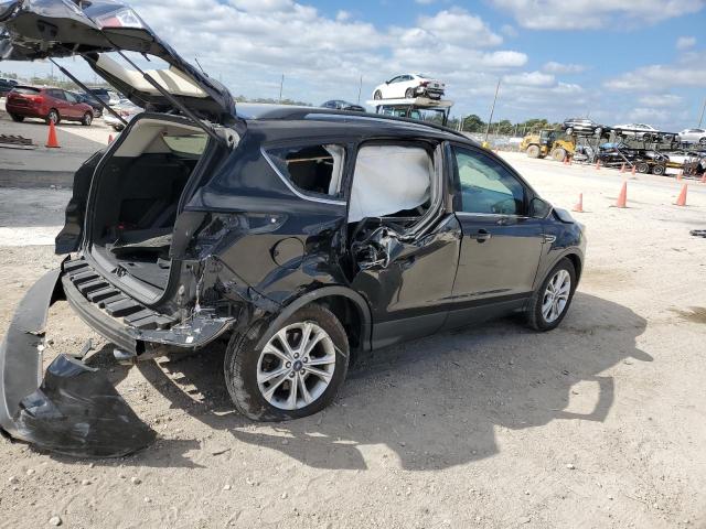 Photo 3 from auction – 2018 FORD ESCAPE SE with VIN 1FMCU0GD3JUC27344