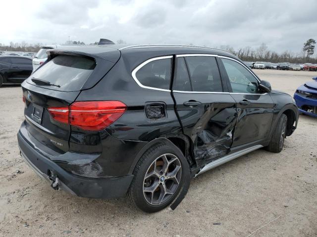 Photo 3 from auction – 2019 BMW X1 XDRIVE2 with VIN WBXHT3C54K3H36787