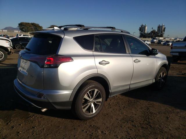 Photo 3 from auction – 2017 TOYOTA RAV4 XLE with VIN 2T3WFREV3HW335293