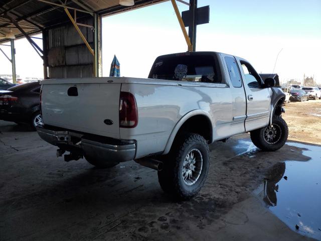 Photo 4 from auction – 2000 FORD F150 with VIN 1FTRX18L1YKA54401