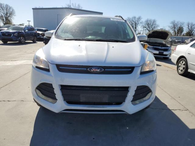 Photo 5 from auction – 2016 FORD ESCAPE SE with VIN 1FMCU9G96GUC63361