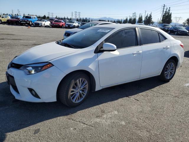 TOYOTA COROLLA L 2014 with VIN 5YFBURHE4EP037034 - Photo from auction