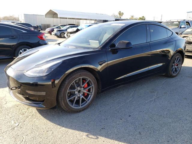 TESLA MODEL 3 2022 with VIN 5YJ3E1EAXNF322143 - Photo from auction
