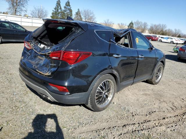 Photo 3 from auction – 2018 HYUNDAI SANTA FE S with VIN 5NMZU4LA3JH083447