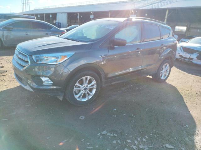 FORD ESCAPE SE 2018 with VIN 1FMCU0GD2JUD56885 - Photo from auction