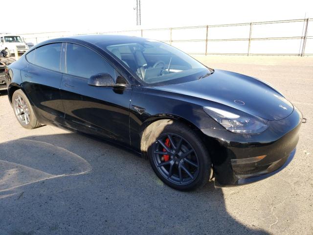 Photo 4 from auction – 2022 TESLA MODEL 3 with VIN 5YJ3E1EAXNF322143