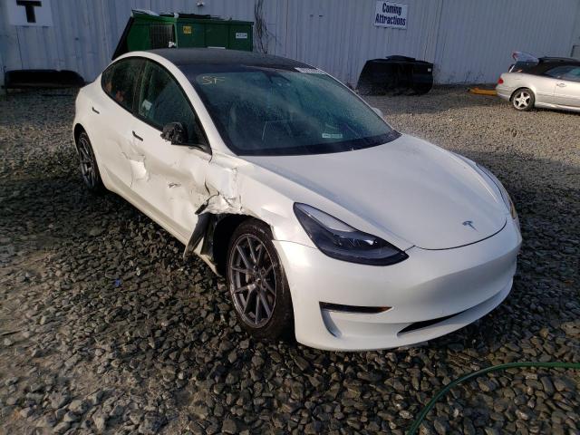 Photo 4 from auction – 2021 TESLA MODEL 3 with VIN 5YJ3E1EBXMF044710