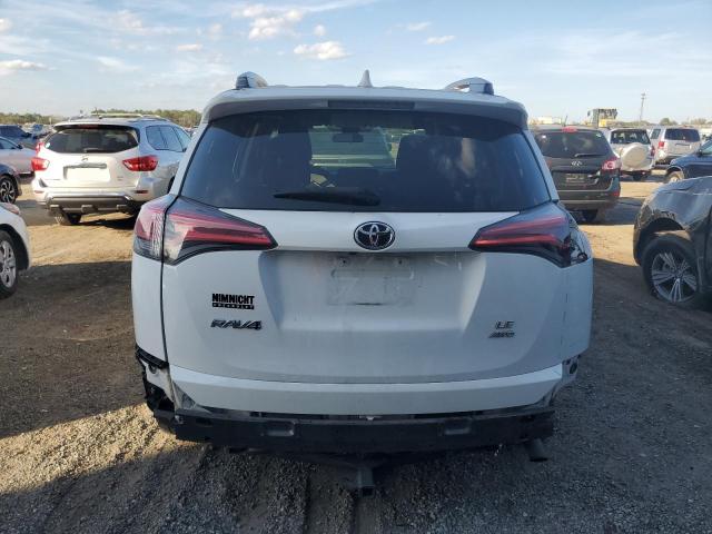 Photo 6 from auction – 2017 TOYOTA RAV4 LE with VIN 2T3BFREV4HW612225