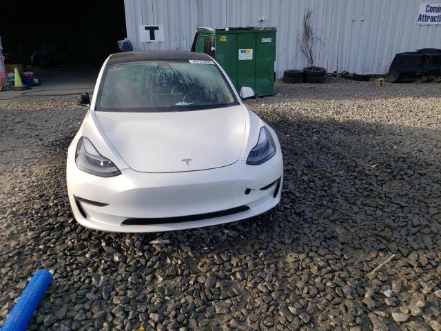 Photo 5 from auction – 2021 TESLA MODEL 3 with VIN 5YJ3E1EBXMF044710