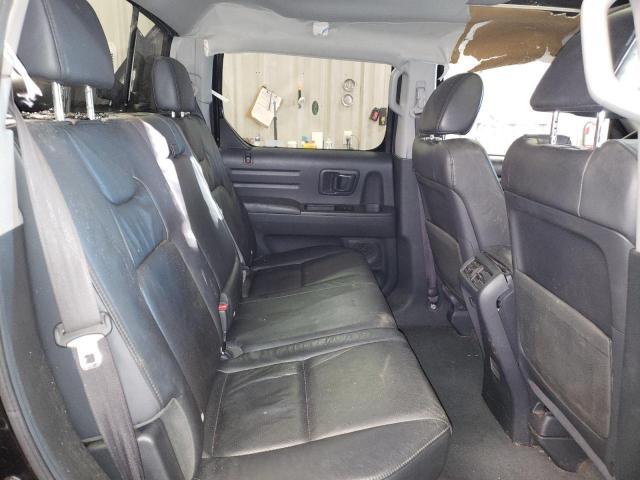 Photo 10 from auction – 2009 HONDA RIDGELINE with VIN 5FPYK165X9B100604